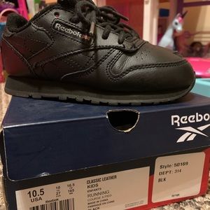 Black Reeboks “Classics”.  Kids Unisex.